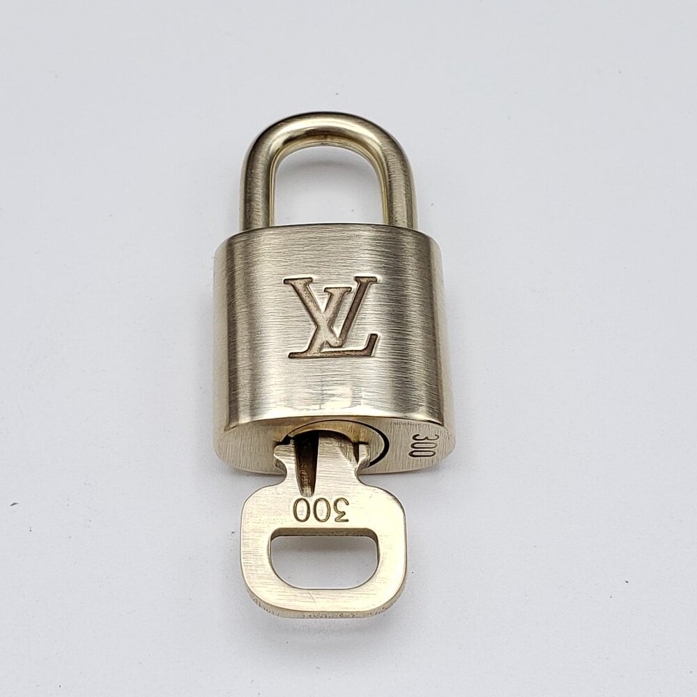 Authentic Louis Vuitton Gold Padlock In Excellent Shiny Brass 011526